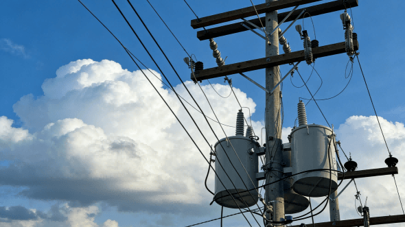 Distribution transformers on a utility pole Distribution transformers on a utility pole