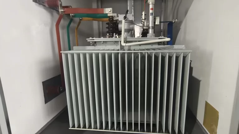 Oil-immersed distribution transformer with drop-out fuse and surge arrester inside a box-type substation chamber