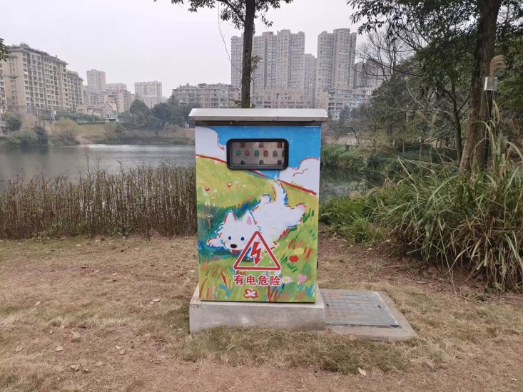 Painted electrical cabinet in park Painted electrical cabinet in park