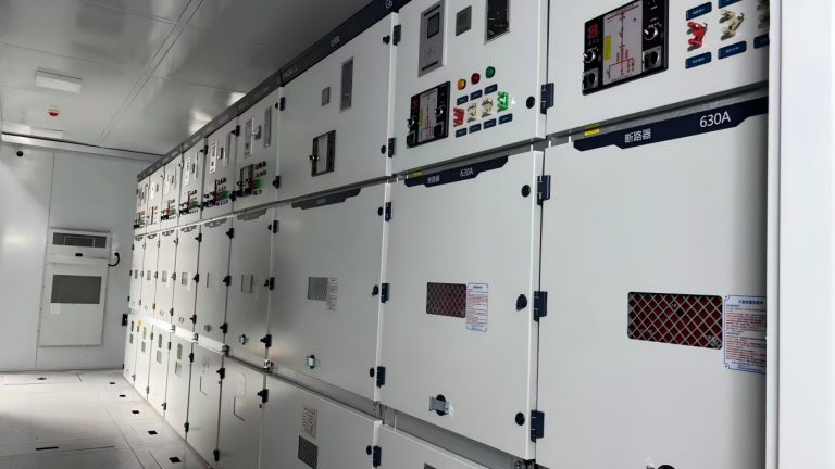 Row of KYN28A-12 medium voltage switchgears inside prefabricated power cabin
