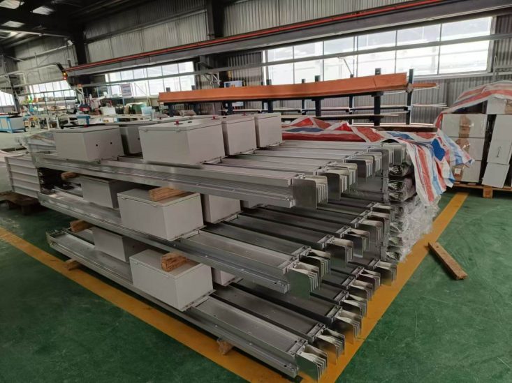 Stacked finished busway products in the factory workshop Stacked finished busway products in the factory workshop