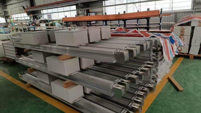 Stacked finished busway products in the factory workshop Stacked finished busway products in the factory workshop