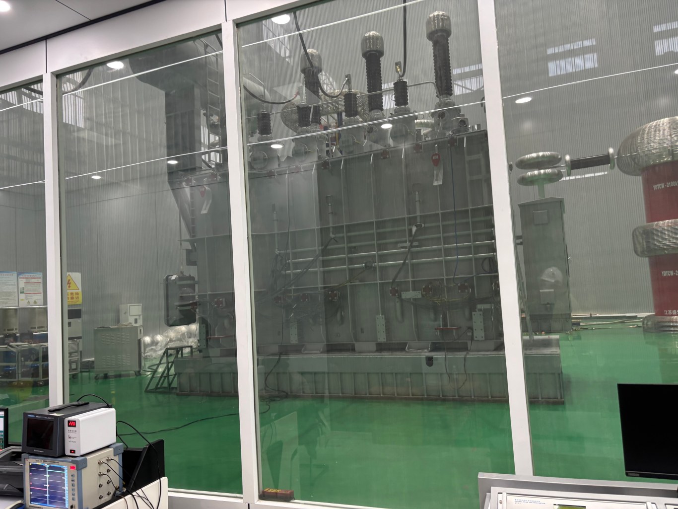 The power transformer is undergoing factory testing